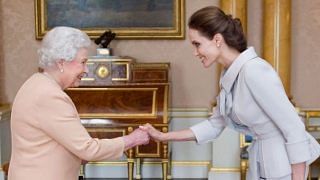 celebrities meet the Queen