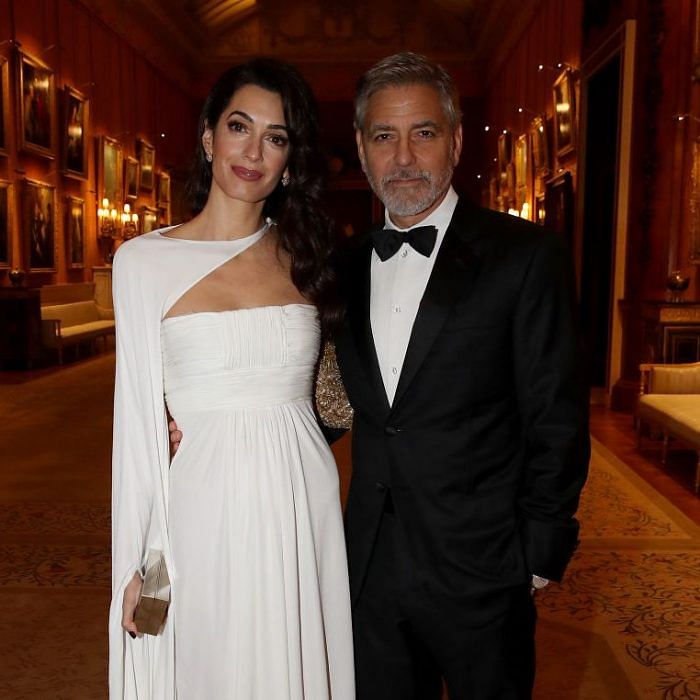 Amal Clooney and George Clooney Attends A Dinner