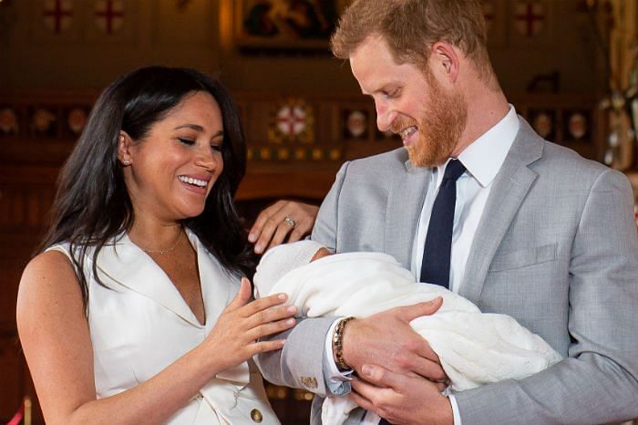 Duke and Duchess of Sussex pose with newborn baby