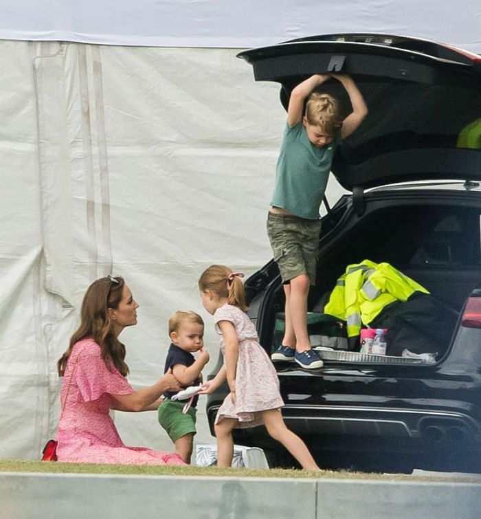 The Duchess of Cambridge, Prince Louis, Prince George, and Princess Charlotte