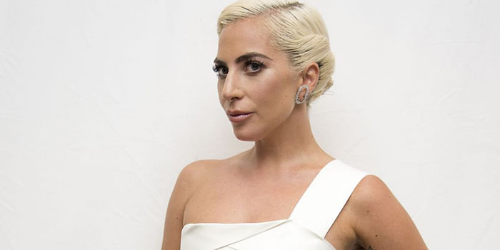hbsg-lady-gaga-at-the-a-star-is-born-press-conference-at-the-news-photo