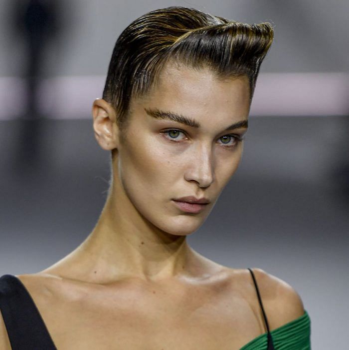 Bella Hadid transformed for the Haider Ackermann runway with bleached brows