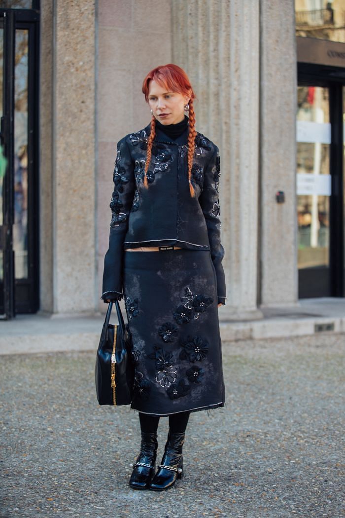 Tamara Kalinic wears a black leather and fabric Birkin handbag from News  Photo - Getty Images