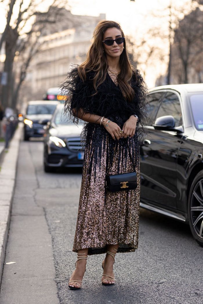 Tamara Kalinic wears a black leather and fabric Birkin handbag from News  Photo - Getty Images
