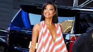 Gabrielle Union's Whimsical Dress Includes Structured Orbs On The Hem