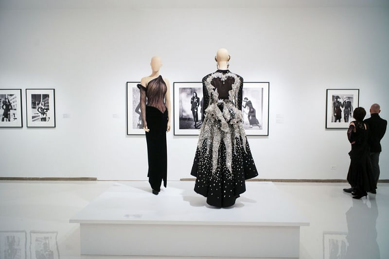 Archival pieces from the ’90s on display in a gallery dedicated to Helmut Newton’s photography of Mugler.