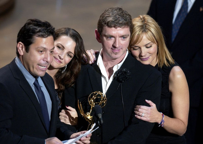Darren Star accepting an Emmy when Sex and the City won Outstanding Comedy Series in 2001, alongside Kristin Davis, Michael Patrick King, and Kim Cattrall.