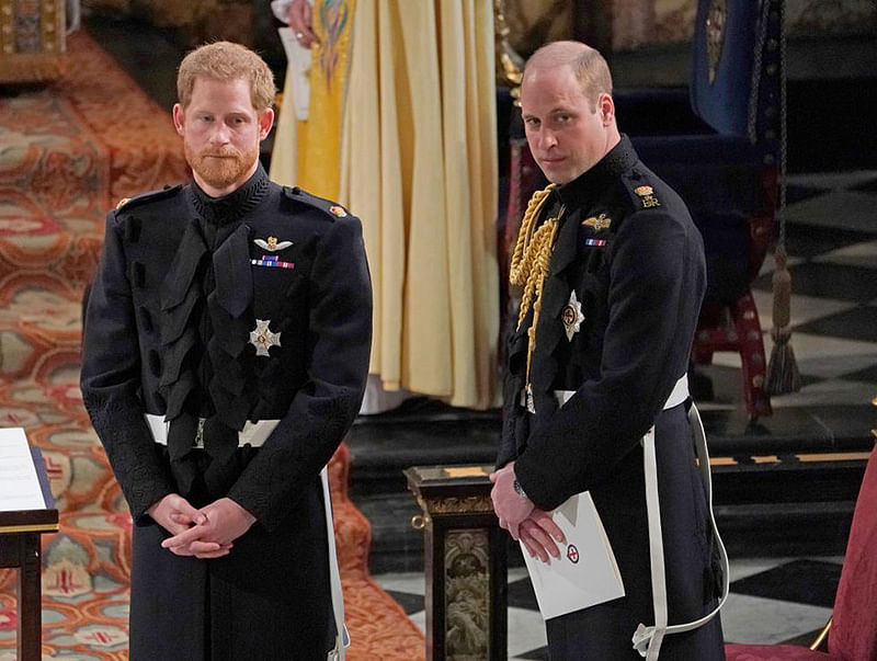 The royal brothers stand side-by-side at Harry and Meghan’s wedding.