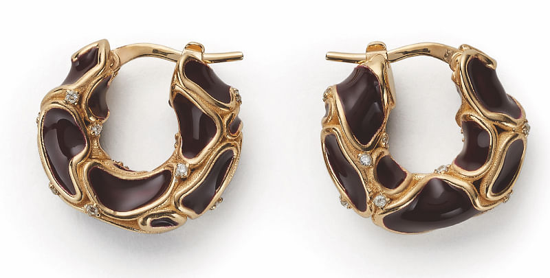 Earrings, $1,070, Bottega Veneta