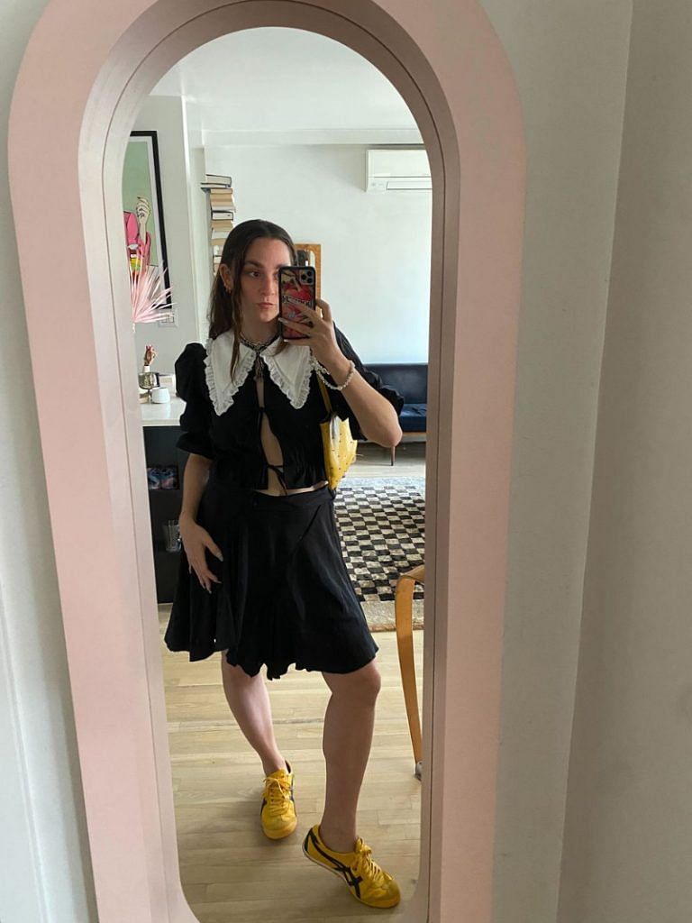 Tara wearing her Onitsukas with a vintage Roberto Cavalli skirt from The Real Real, 1990s Miu Miu bag from James Veloria, and a top from MaisonCléo.