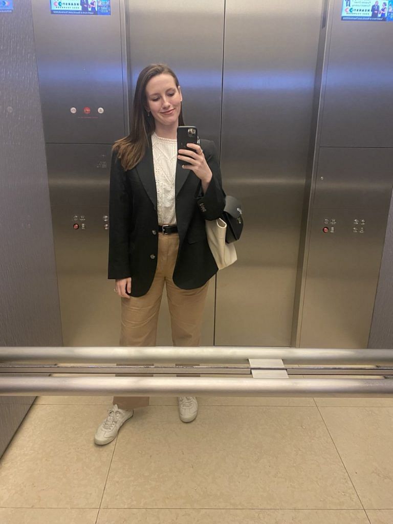 Then, wearing the sneakers to BAZAAR HQ with an Everlane blazer, Sézane top, Emme Parsons belt, and Mara Hoffman chinos.