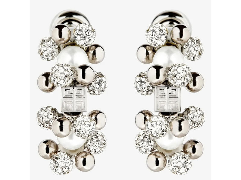 Earrings, $1,200, Givenchy